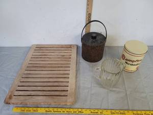 lot 560 image: Cutting board  ice bucket  glass pitcher & metal tin
