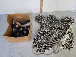 lot 565 image: American flag & truck bed net