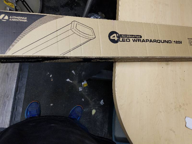 lot 1828 image: Lithonia Lighting 4 LED Wraparound -used