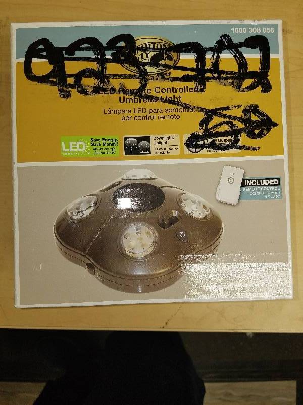 lot 1923 image: Hampton Bay LED Remote Controlled Unbrella Light