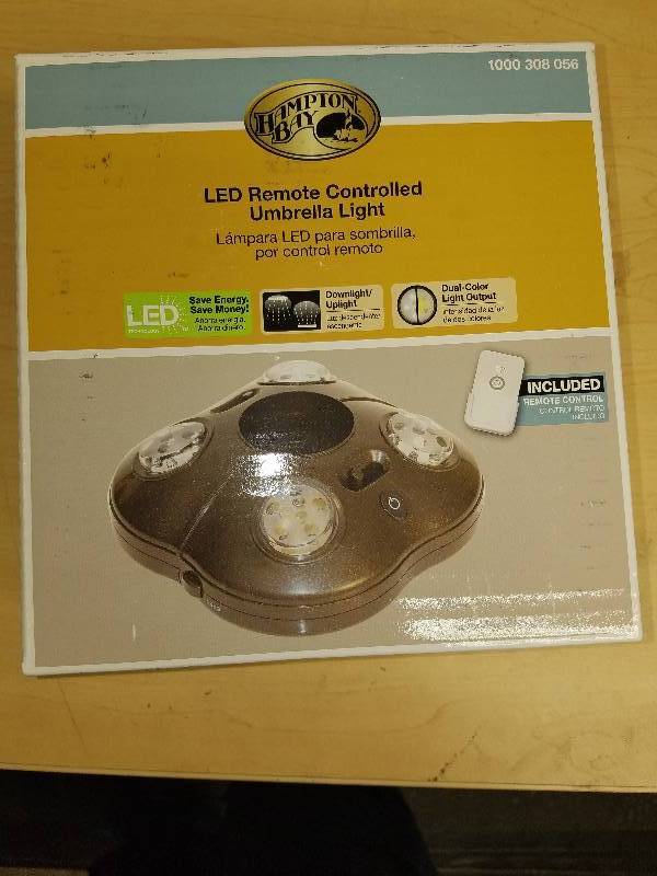 lot 1924 image: Hampton Bay LED Remote Controlled Unbrella Light