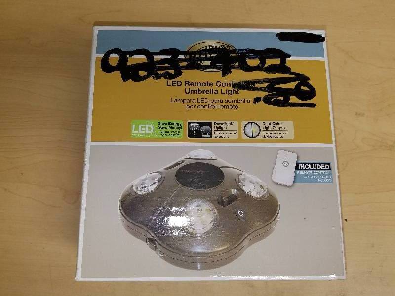 lot 1925 image: Hampton Bay LED Remote Controlled Unbrella Light