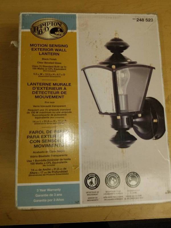 lot 1926 image: Hampton Bay Motion Sensing Exterior wall Lantern