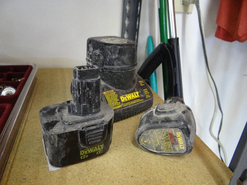 lot 304 image: Dewalt batteries & charger.
