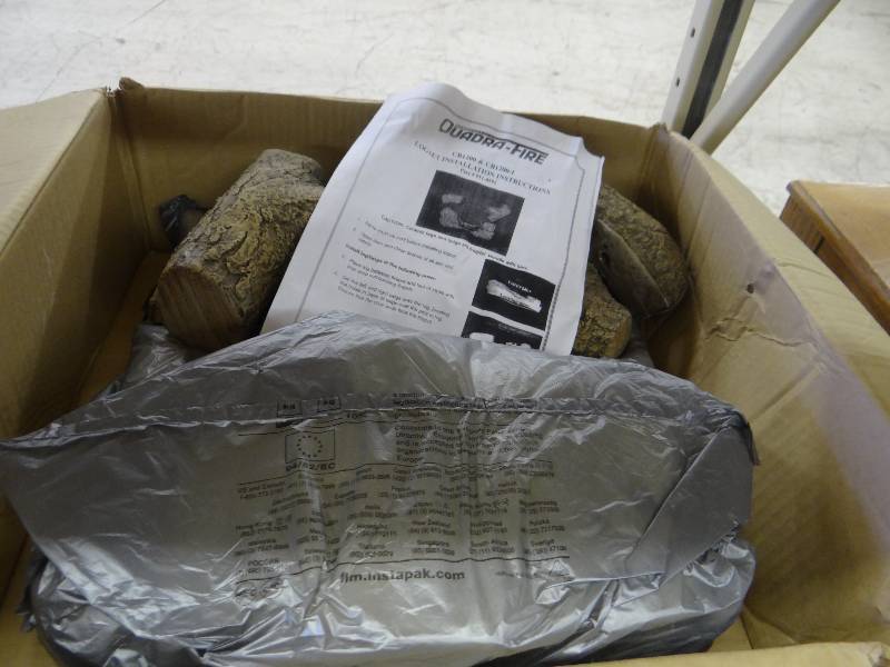 lot 337 image: Fake fireplace logs.