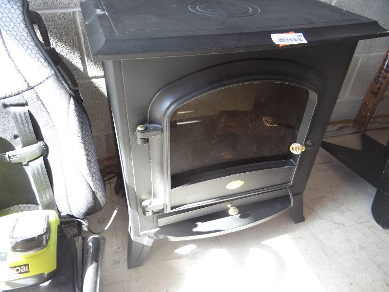 lot 380 image: Fake fireplace heater.