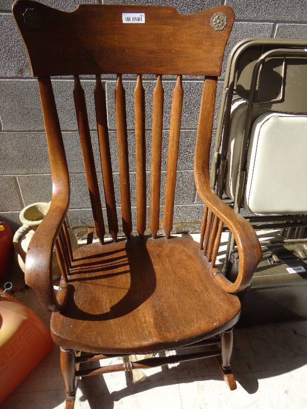 lot 385 image: Old wooden rocking chair.