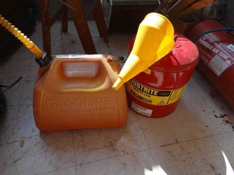 lot 386 image: 2 gas cans, 1 metal wfunnel.