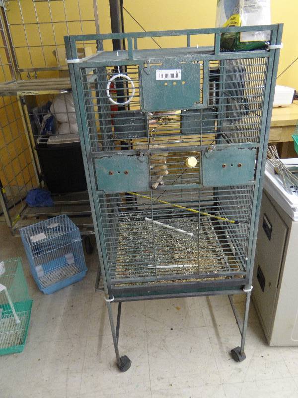 lot 430 image: Big bird cage on wheels, 4 4 tall.
