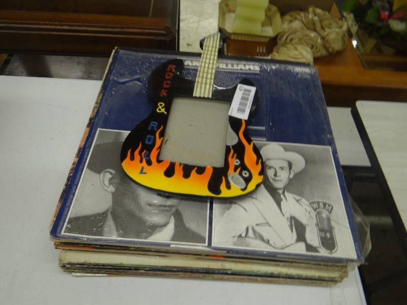 lot 471 image: Guitar picture frame, records.