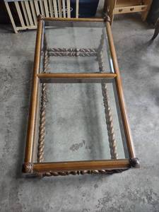 lot 1643 image: 42 inches long 21 inches wide 18 in tall glass and wood coffee table