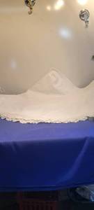 lot 1890 image: Forty eight round white tablecloth