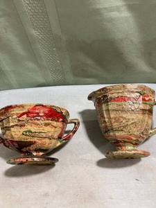 lot 5244 image: Sugar and creamer set unusual design not sure the material is made out of