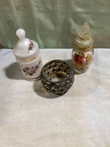 lot 5272 image: 2) candleholders. 1) jar with flowers.