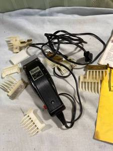 lot 7665 image: RAYCINE electric hair clippers worksI