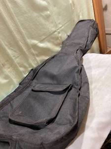 lot 7732 image: 34 12 inch guitar case with pocket