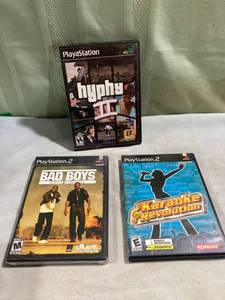 lot 7775 image: 2) play station 2 DVDs 1) PlayStation, DVD