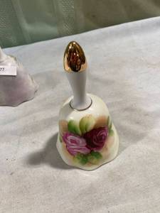 lot 7778 image: 5 14�� rose, ceramic Bell