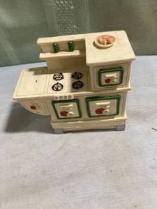 lot 7882 image: The San Francisco music box, Company, old fashion stove
