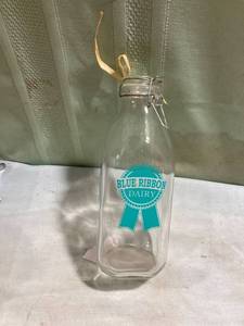 lot 7898 image: Blue ribbon dairy milk bottle, 9 14 inch