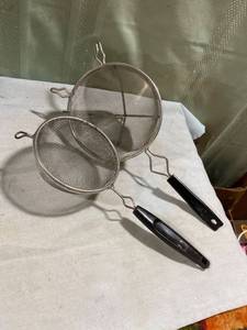 lot 7926 image: 14 inch, 12 inch hand strainers