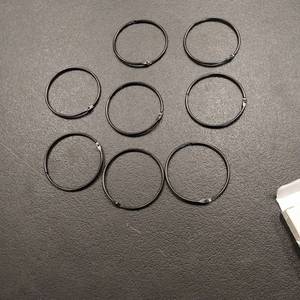 lot 8690 image: 2 and 34 binder rings black. 8 piece.
