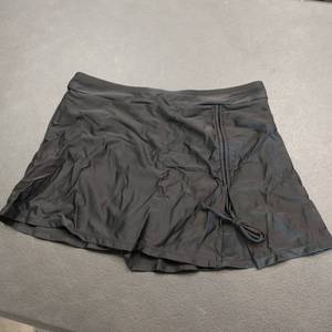 lot 8734 image: Black skirt bottom large swimwear, top not included.
