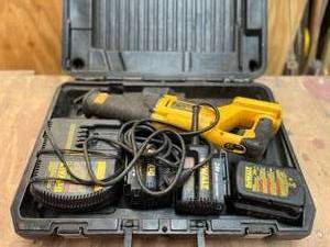 lot 1003 image: Dewalt Cordless 24 Volt Variable Speed Reciprocating Saw with ACDC Inverter