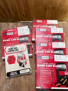 lot 1052 image: (7) Unopened Bandsaw Blades and Sanding Belt Lot. Craftsman Brand