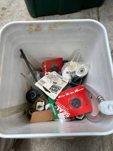 lot 1058 image: Lot of Misc Plumbing Hardware - Tub Drain, Toilet Hose, Seals