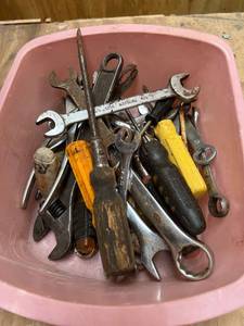lot 1074 image: Pink Tote of Pliers, Wrenches, and Screwdrivers