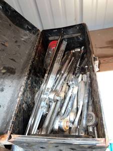 lot 1086 image: Black Metal Toolbox with Socket Set Wrenches and Parts