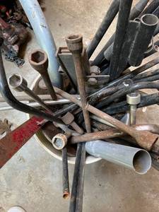 lot 2023 image: Bucket of Four Square Bars and Misc Pipes