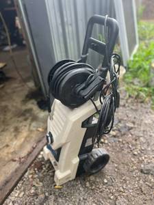 lot 1192 image: Pulsar PWE2000 2000PSI 1.6 GPM 13.5 Amp Portable Electric Pressure Washer W Onboard Hose Reel