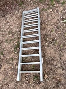 lot 1236 image: Pair of Truck or Trailer Ramps 20 in x 6ft. folds out to 42 inches x 6ft best for lawn equipment or ATVs