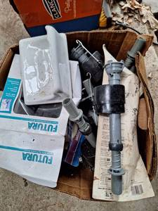 lot 3191 image: Lot of Plumbing Toilet Toilet Replacement Pieces and Dirt Devil