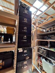 lot 6012 image: (2) Black Filing Cabinets Used for Storing Misc Shop Items