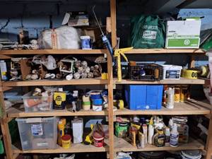lot 4549 image: Contents of Shelf - Caulking, Tape, and Carpentry Glue
