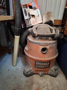 lot 1702 image: Rigid 1660 Wet Dry Vacuum includes brand new filter