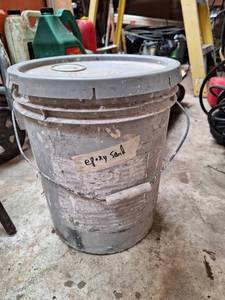 lot 1744 image: 5 Gallon Bucket with Epoxy Sand- sand blasting medium