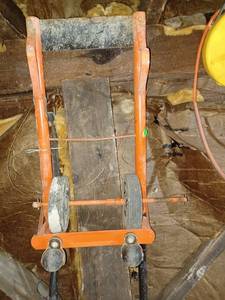 lot 1804 image: Orange and Black Dolly - Needs Repaired