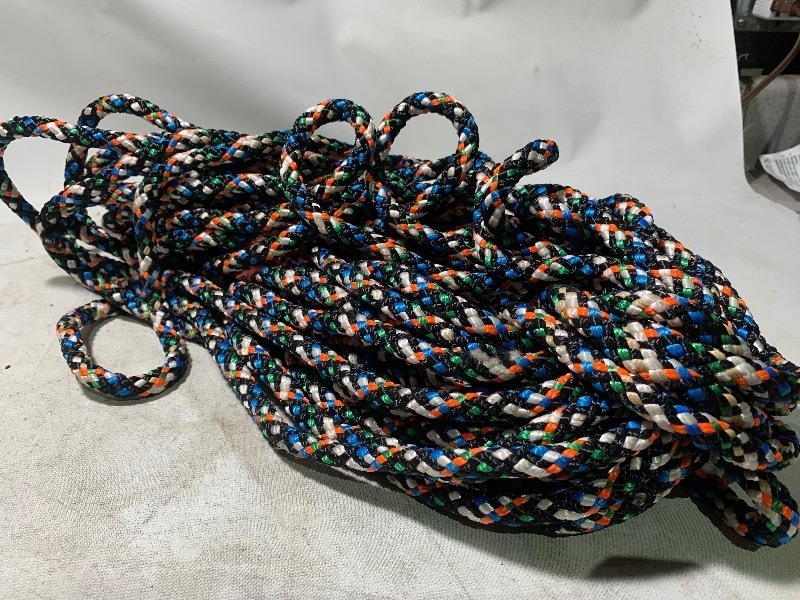 lot 100 image: New 50ft Role of Premium Strength Woven Rope, BlackOrange