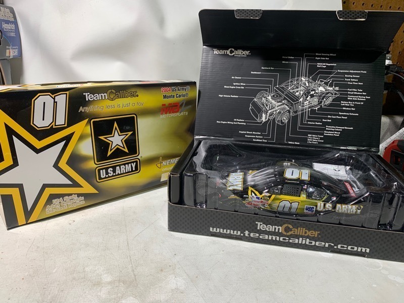 lot 413 image: Team Caliber Owners Series Nascar 2004 Limited Edition No.01 US Army Monte Carlo MB2 Race Car, 124 Scale  Die Cast Metal