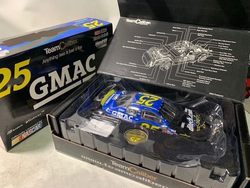 lot 414 image: Team Caliber Owners Series Nascar 2004 Limited Edition No.25 GMAC Hendricks Motorsport Monte Carlo MB2 Race Car, 124 Scale  Die Cast Metal