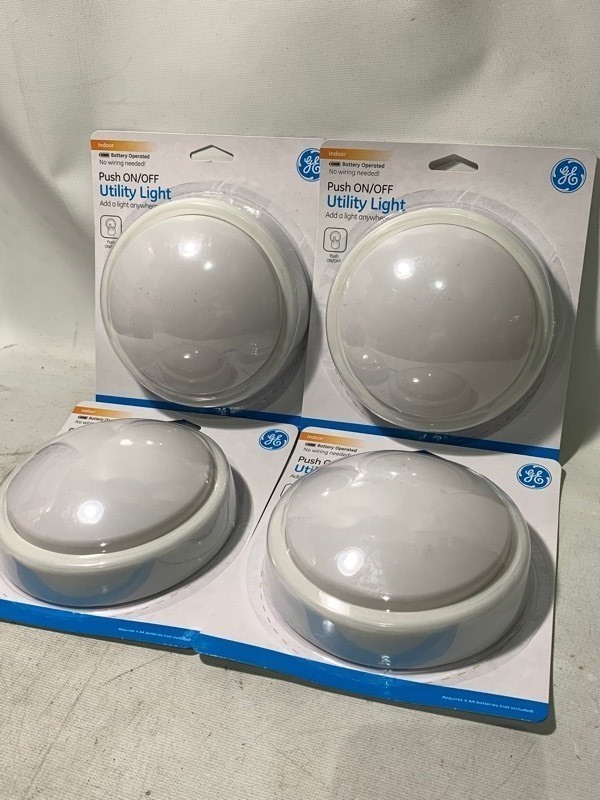 lot 211 image: New 4pc Set of GE Indoor 5.5 Push OnOff Utility Lights