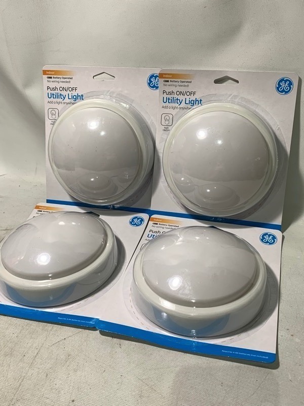 lot 212 image: New 4pc Set of GE Indoor 5.5 Push OnOff Utility Lights