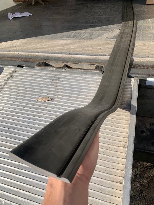 lot 287 image: 5 New Pieces of Commercial Grade Flexible Baseboard Trim (8ft L x 4.25 T per Pieces)