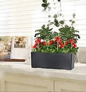 lot 9288 image: Garden Basix Self Watering Flower shelf with coco pith