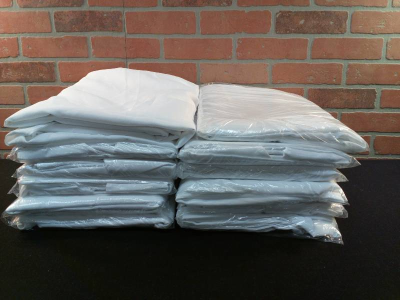 lot 15 image: Round Polyester Tablecloths