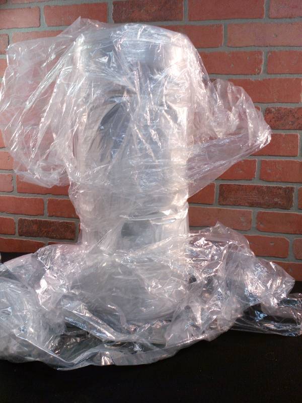 lot 35 image: Protective Plastic for hanging clothes for dry cleaning or storage